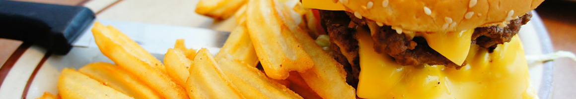 Eating American (Traditional) Burger Hot Dog at Cardinal Drive-In restaurant in Brevard, NC.
